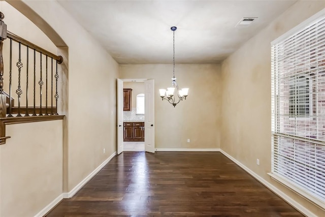 3519 Alexandrite Way, Round Rock, TX 78681 - unfurnished dining area featuring a chandelier and dark wood-style floors