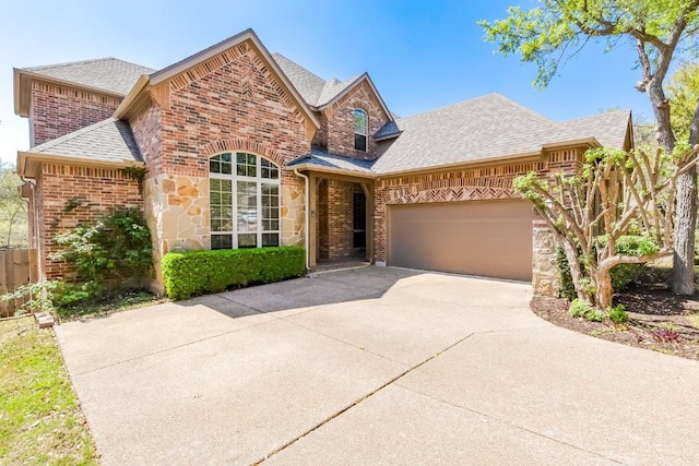 3519 Alexandrite Way, Round Rock, TX 78681 - view of front of property featuring roof with shingles, brick siding, a garage, and concrete driveway
