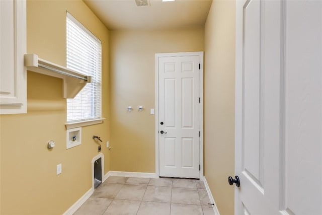 3519 Alexandrite Way, Round Rock, TX 78681 - laundry area with gas dryer hookup, washer hookup, light tile patterned floors, and electric dryer hookup