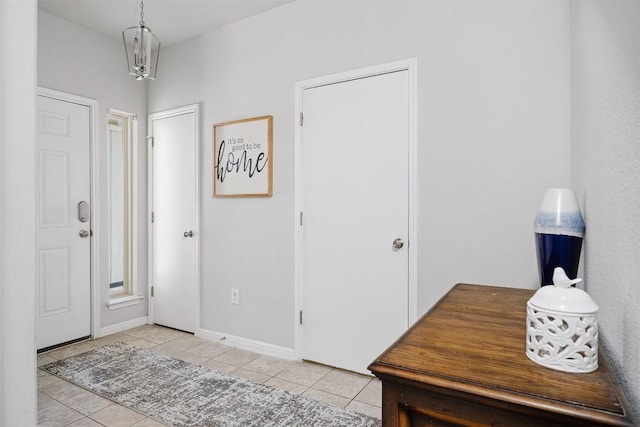 366 Eagle Brook Ln, Buda, TX 78610 - entryway featuring light tile patterned floors and baseboards
