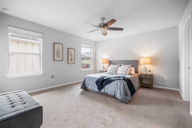 366 Eagle Brook Ln, Buda, TX 78610 - carpeted bedroom with baseboards and a ceiling fan