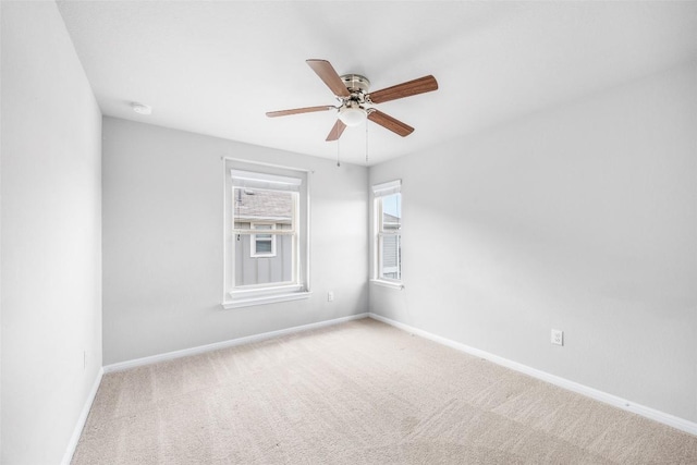 366 Eagle Brook Ln, Buda, TX 78610 - empty room featuring carpet floors, a ceiling fan, and a smoke detector