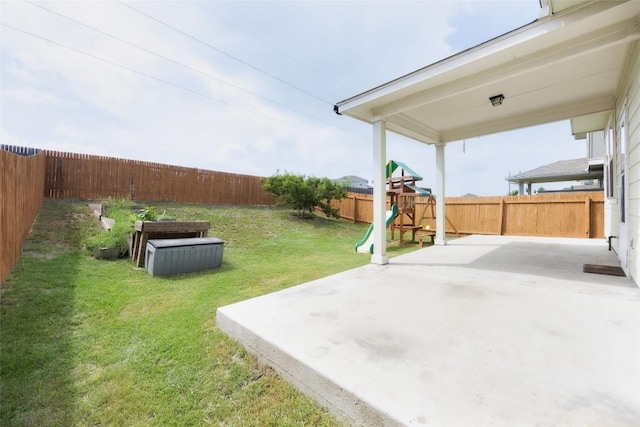 366 Eagle Brook Ln, Buda, TX 78610 - fenced backyard with a patio and a playground