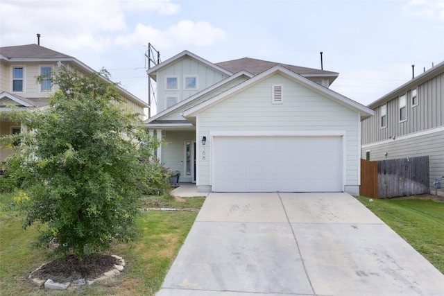 366 Eagle Brook Ln, Buda, TX 78610 - traditional home with board and batten siding, concrete driveway, and a garage
