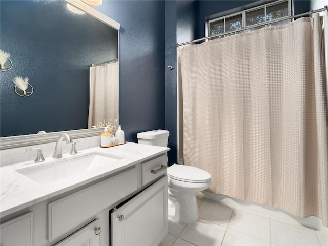 11009 Savannah Ct, Austin, TX 78739 - full bath with tile patterned floors, vanity, and a textured wall