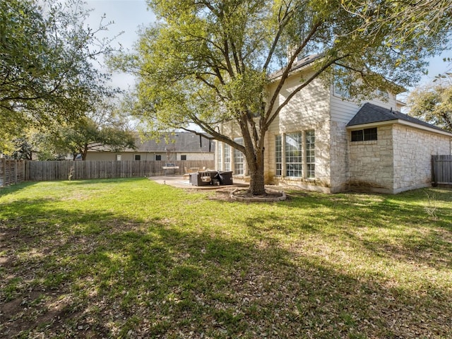 view of yard with a fenced backyard and a patio area