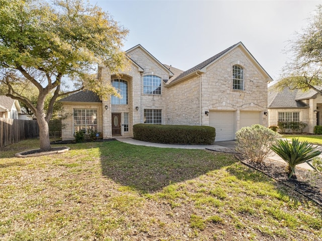 11009 Savannah Ct, Austin, TX 78739 - french provincial home featuring stone siding, an attached garage, and concrete driveway