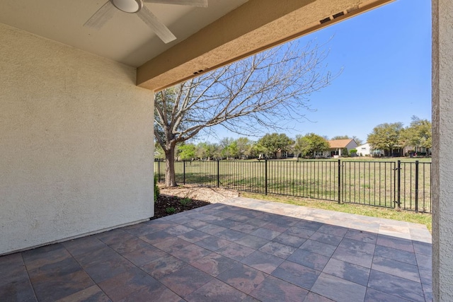 210 Crockett Loop, Georgetown, TX 78633 - view of patio featuring a ceiling fan and a fenced backyard