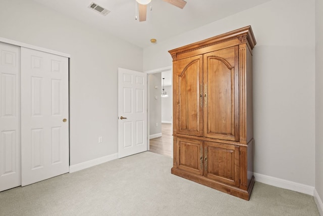 210 Crockett Loop, Georgetown, TX 78633 - unfurnished bedroom featuring light colored carpet, a closet, and baseboards