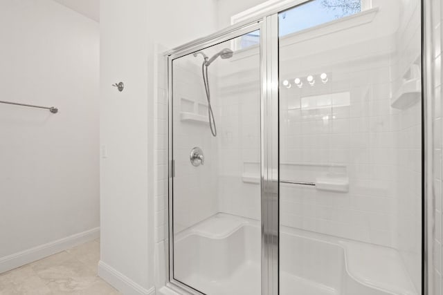 210 Crockett Loop, Georgetown, TX 78633 - full bathroom featuring a stall shower and baseboards
