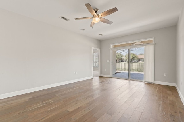 210 Crockett Loop, Georgetown, TX 78633 - spare room with ceiling fan, wood finished floors, and baseboards