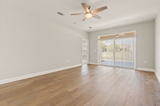 210 Crockett Loop, Georgetown, TX 78633 - empty room featuring ceiling fan, baseboards, and light wood finished floors