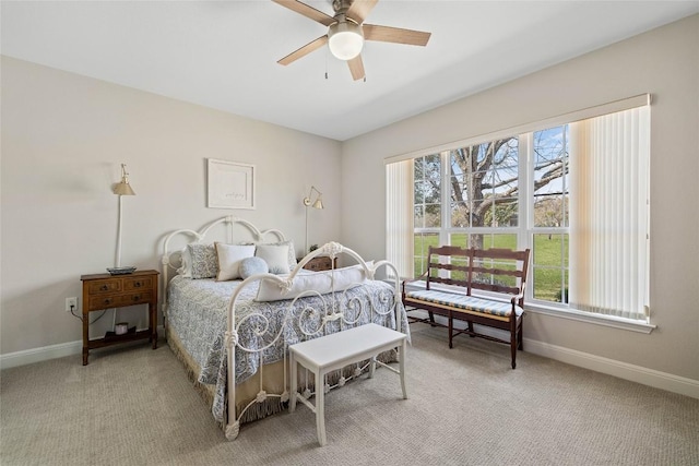 210 Crockett Loop, Georgetown, TX 78633 - bedroom with light carpet, baseboards, and a ceiling fan