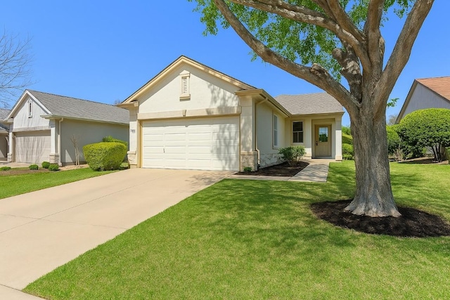 210 Crockett Loop, Georgetown, TX 78633 - single story home featuring stucco siding, a garage, concrete driveway, and a front lawn