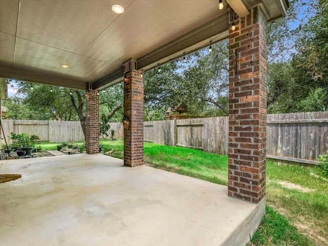1501 Uhland Dr, Leander, TX 78641 - fenced backyard featuring a patio area