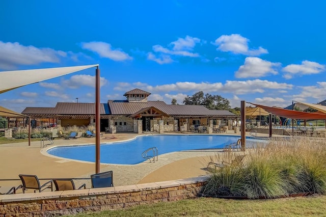 1501 Uhland Dr, Leander, TX 78641 - community pool with a patio area
