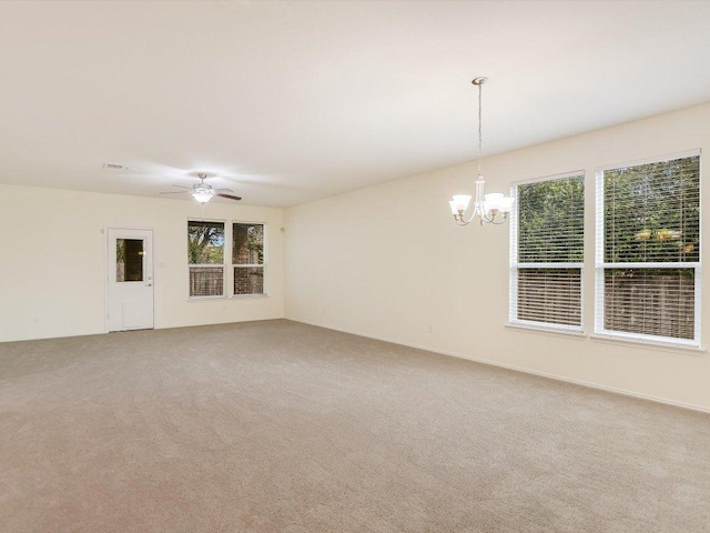 1501 Uhland Dr, Leander, TX 78641 - empty room featuring a chandelier, carpet floors, and ceiling fan