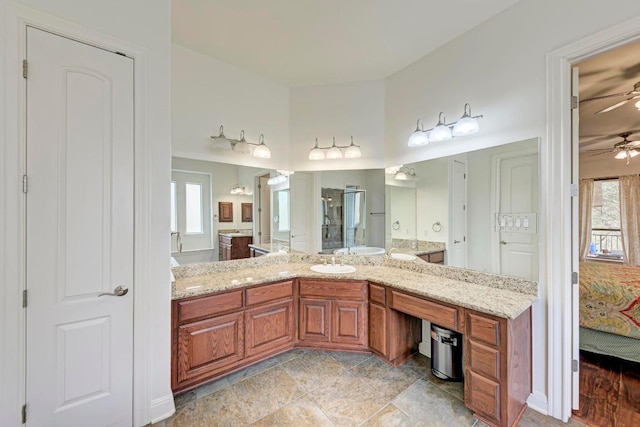 13229 Country Trails Ln, Austin, TX 78732 - full bathroom with a ceiling fan, ensuite bathroom, vanity, and a stall shower