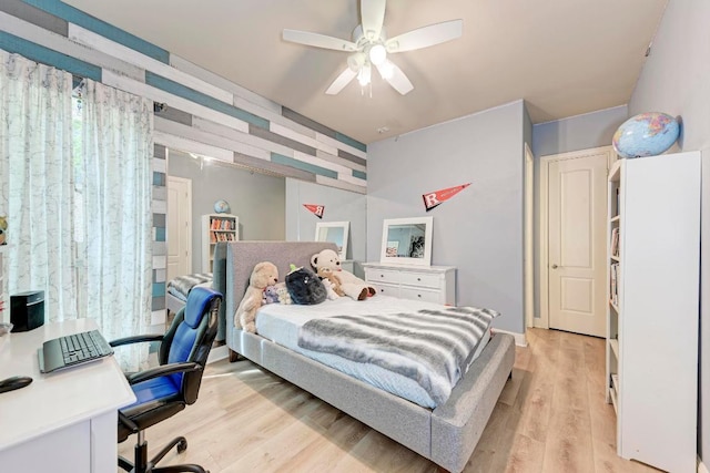 13229 Country Trails Ln, Austin, TX 78732 - bedroom featuring an office area, light wood finished floors, and a ceiling fan