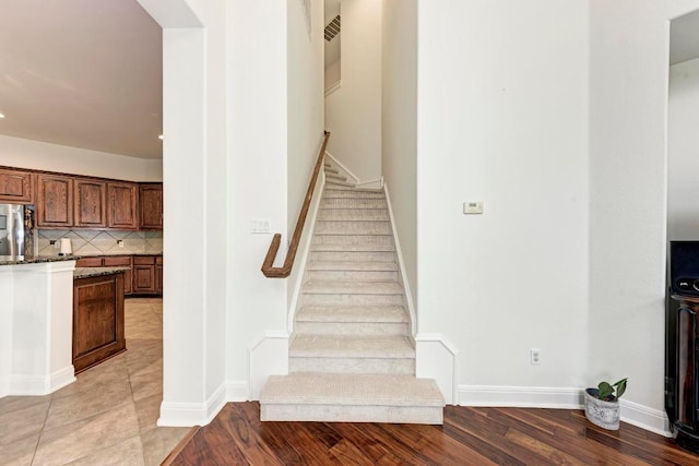 13229 Country Trails Ln, Austin, TX 78732 - stairs with wood finished floors
