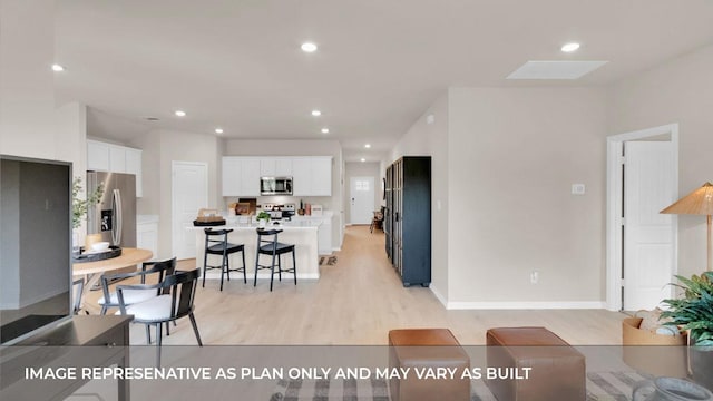 321 Heatherwood Ter, Marble Falls, TX 78654 - living area with recessed lighting, baseboards, and light wood-type flooring