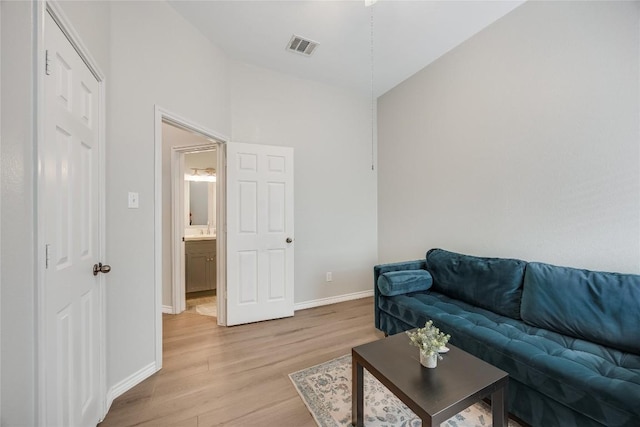 2974 Overland St, Round Rock, TX 78681 - living area with light wood finished floors and lofted ceiling