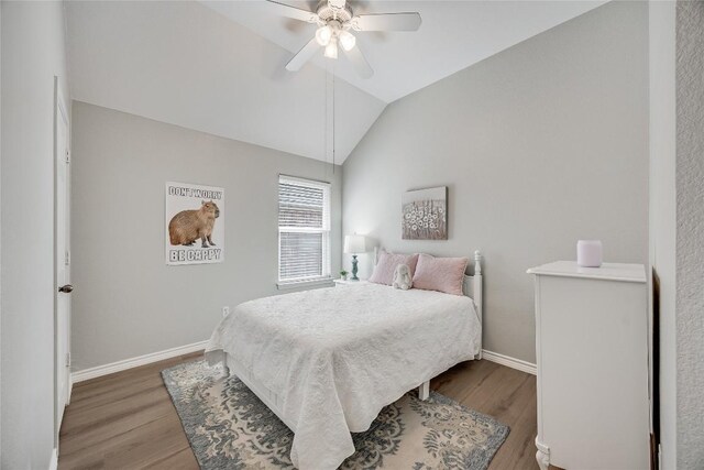 2974 Overland St, Round Rock, TX 78681 - bedroom with wood finished floors, vaulted ceiling, and a ceiling fan