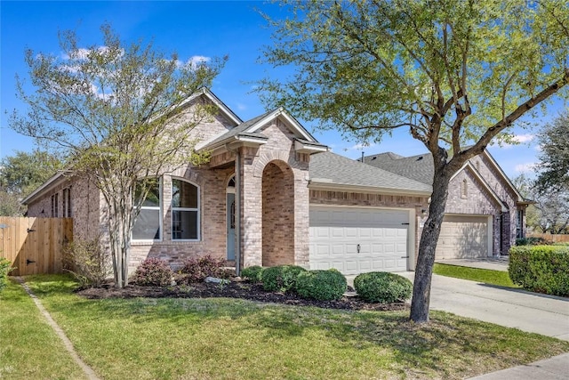 2974 Overland St, Round Rock, TX 78681 - traditional home featuring an attached garage, brick siding, concrete driveway, and roof with shingles