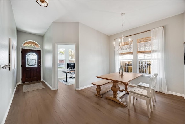 2974 Overland St, Round Rock, TX 78681 - dining space with a chandelier, wood finished floors, and a desk