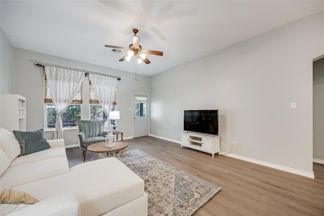 2974 Overland St, Round Rock, TX 78681 - living area with wood finished floors and ceiling fan