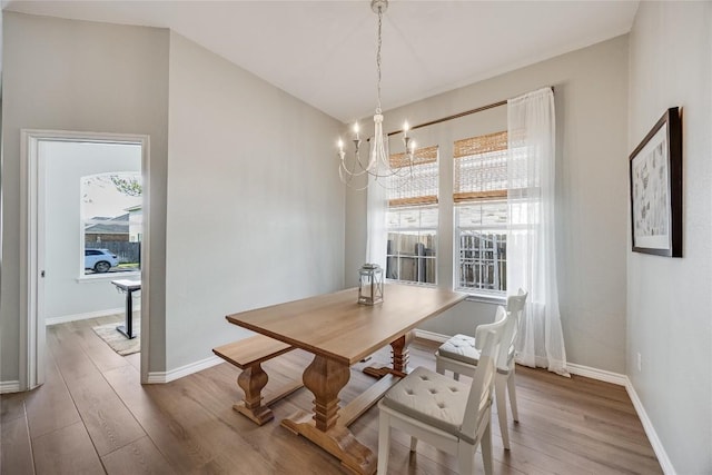 2974 Overland St, Round Rock, TX 78681 - dining area with wood finished floors and a chandelier