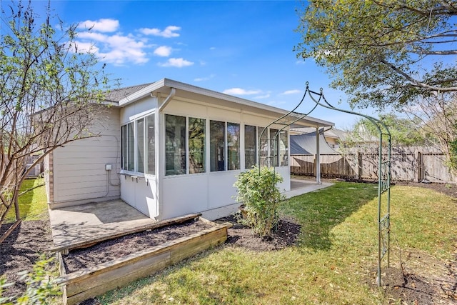 2974 Overland St, Round Rock, TX 78681 - back of property featuring a sunroom and a patio area