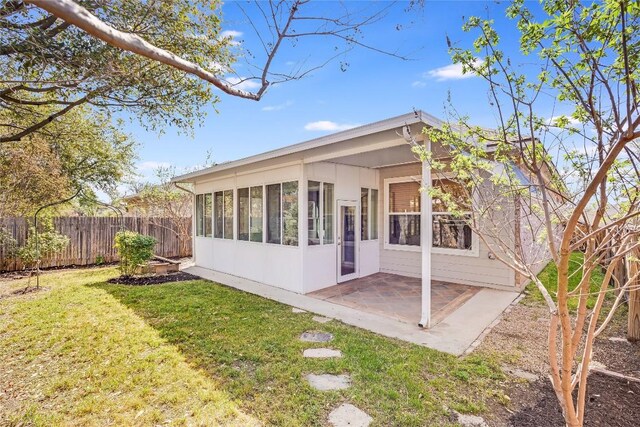2974 Overland St, Round Rock, TX 78681 - rear view of property featuring a patio and a sunroom