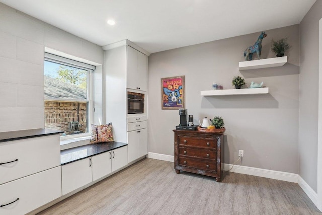 6608 Breezy Pass, Austin, TX 78749 - interior space with light wood finished floors and recessed lighting