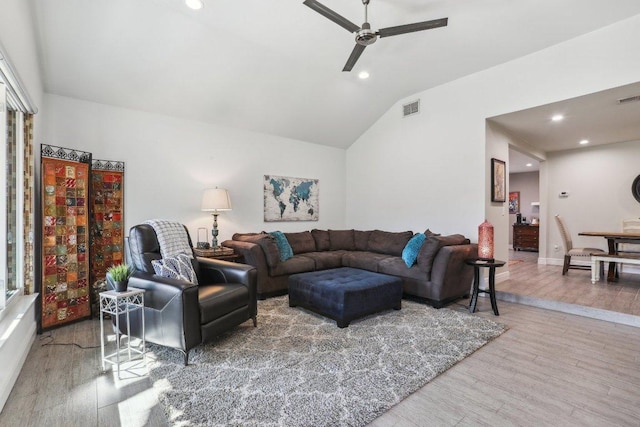 6608 Breezy Pass, Austin, TX 78749 - living room with lofted ceiling, wood finished floors, ceiling fan, and recessed lighting