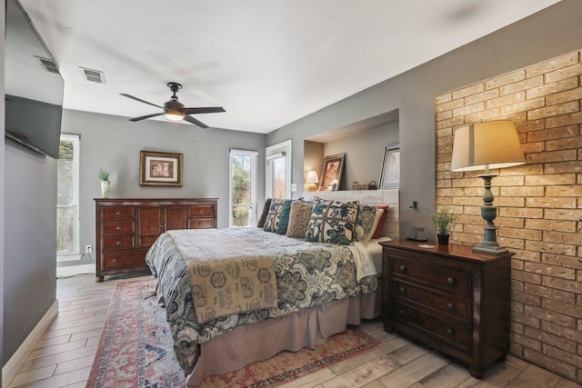 6608 Breezy Pass, Austin, TX 78749 - bedroom featuring light wood-style floors and ceiling fan