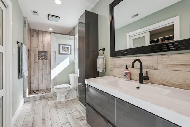 6608 Breezy Pass, Austin, TX 78749 - full bath with vanity, tiled shower, and recessed lighting