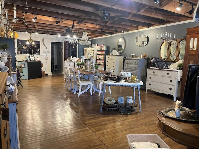 interior space featuring a notable chandelier and hardwood / wood-style flooring
