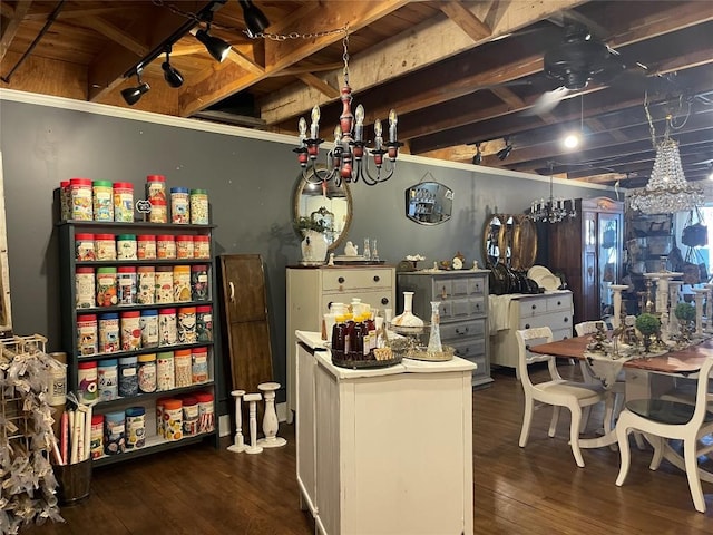 interior space with a notable chandelier and wood finished floors