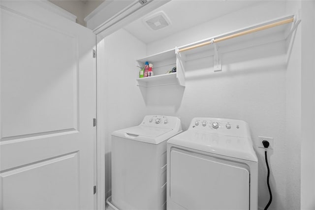 1512 Honaker Way, Leander, TX 78641 - washroom featuring washer and clothes dryer
