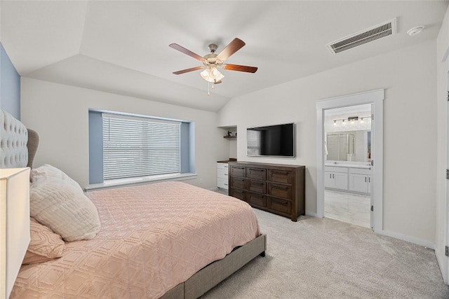 1512 Honaker Way, Leander, TX 78641 - bedroom featuring ensuite bath, vaulted ceiling, carpet flooring, ceiling fan, and baseboards