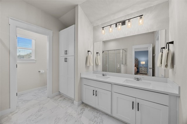 1512 Honaker Way, Leander, TX 78641 - ensuite bathroom with double vanity, a stall shower, and marble look tiles