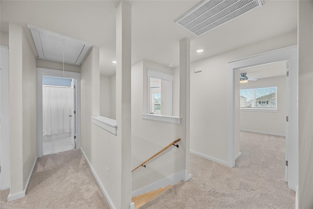 1512 Honaker Way, Leander, TX 78641 - hallway with attic access, an upstairs landing, carpet, baseboards, and recessed lighting