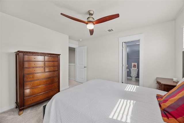 1512 Honaker Way, Leander, TX 78641 - bedroom with light colored carpet, ensuite bathroom, and ceiling fan