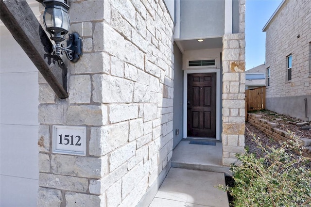 1512 Honaker Way, Leander, TX 78641 - doorway to property featuring stone siding