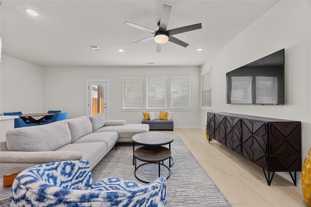 1512 Honaker Way, Leander, TX 78641 - living room featuring light wood-type flooring, ceiling fan, recessed lighting, and baseboards