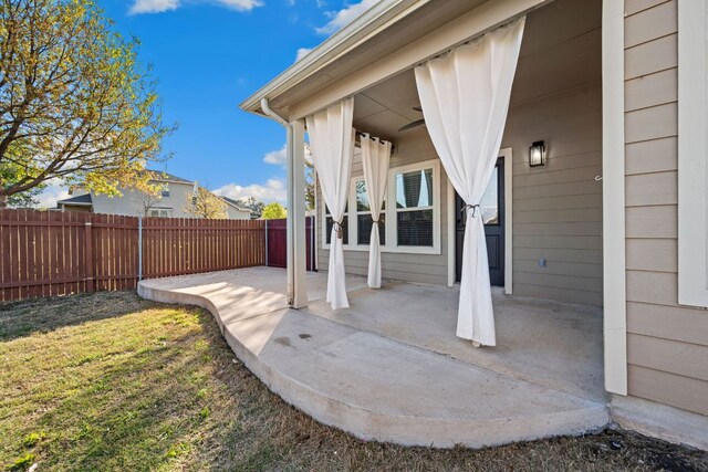 view of patio with fence