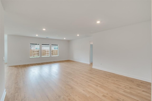 544 Tekoa Dr, Georgetown, TX 78628 - spare room featuring recessed lighting, baseboards, and light wood-type flooring