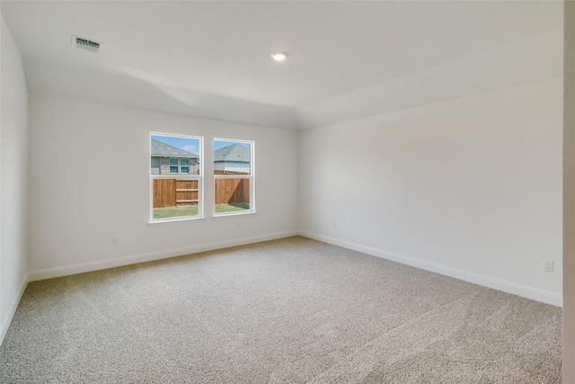 544 Tekoa Dr, Georgetown, TX 78628 - spare room featuring baseboards, visible vents, and light carpet