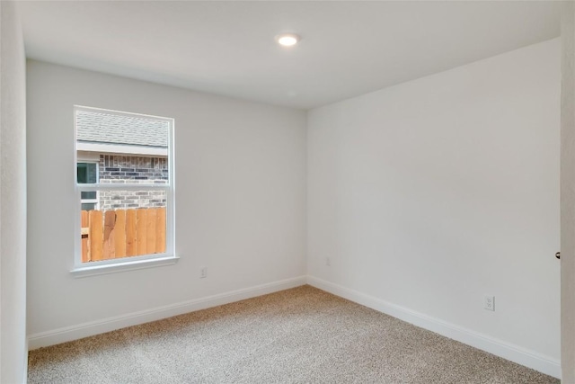 544 Tekoa Dr, Georgetown, TX 78628 - empty room with baseboards, carpet flooring, and recessed lighting